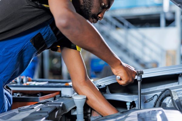 Diversity-male-afro-mechanic-02-strap